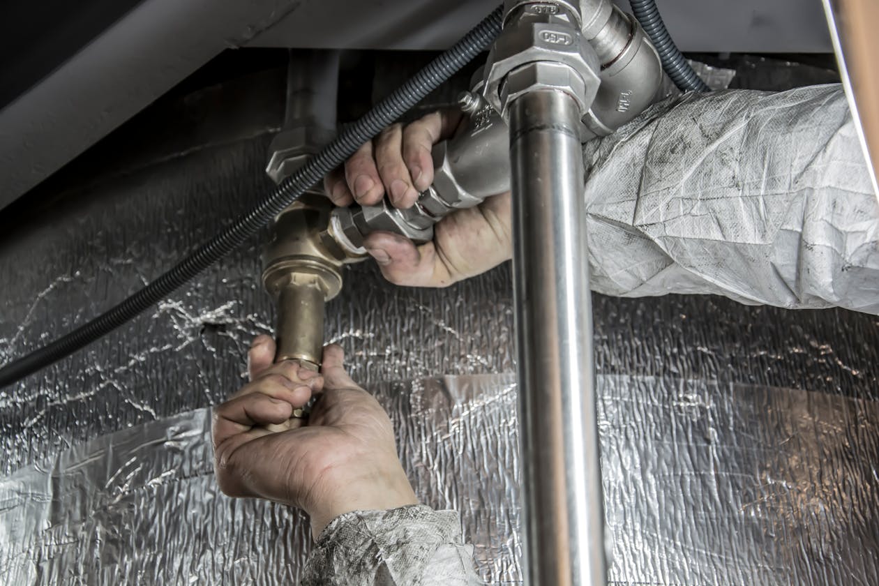 Water damage restoration professional at work
